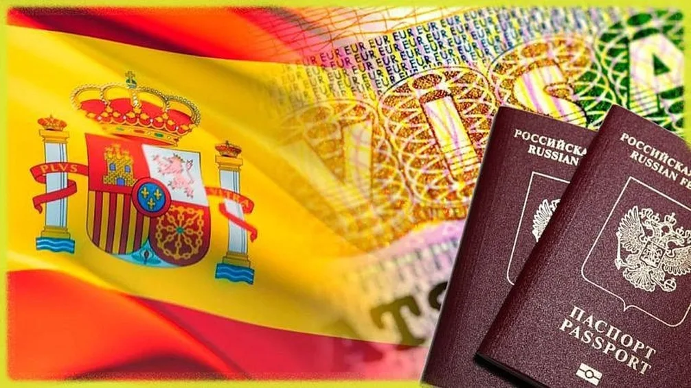 Российские загранпаспорта, виза и флаг Испании